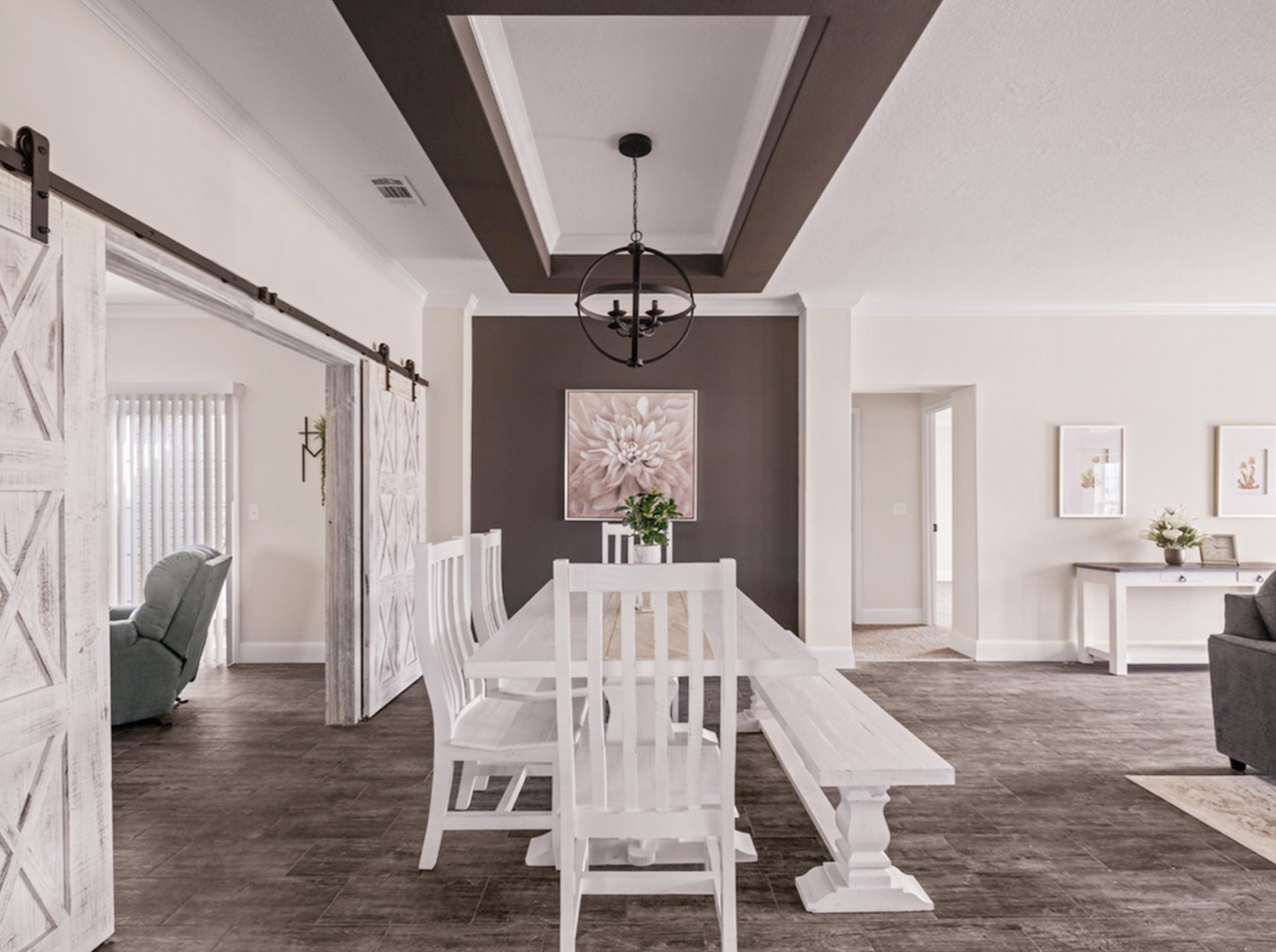 Modern dining room in a high-quality manufactured home, showcasing elegant design and custom features
